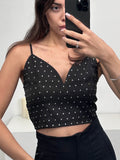 Top con micro strass a triangolo