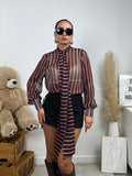Camicia semitrasparente a righe