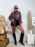 Camicia semitrasparente a righe