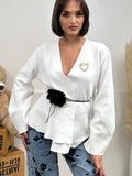 Cardigan con fiocco in vita