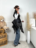 Gilet in ecopelle con cintura