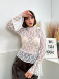 Maglia in pizzo CON POLSINO AMPIO