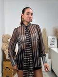 Camicia semitrasparente a righe