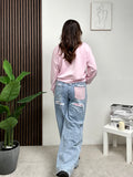 Jeans con strass rosa