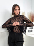 Maglia in pizzo CON POLSINO AMPIO