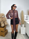 Camicia semitrasparente a righe