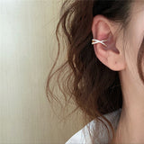 Ear cuff a crociate