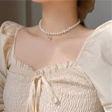 Collana a choker con perle