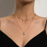 Collana girocollo con pendenti margherite