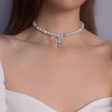 Collana a choker con ciondolo croce